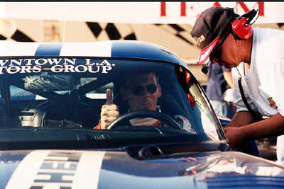 Ron talking to Erik in the drivers seat